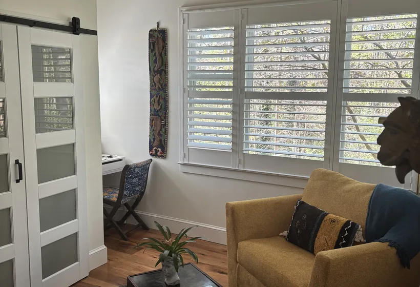 Large rear addition framed and joined onto an existing single-story home