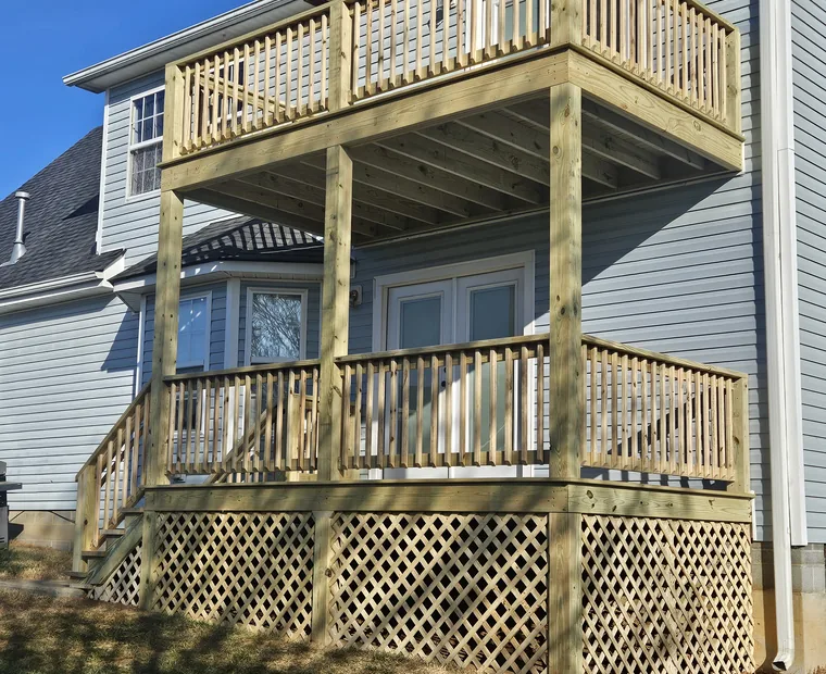 Two-story deck with lattice skirting on a residential home